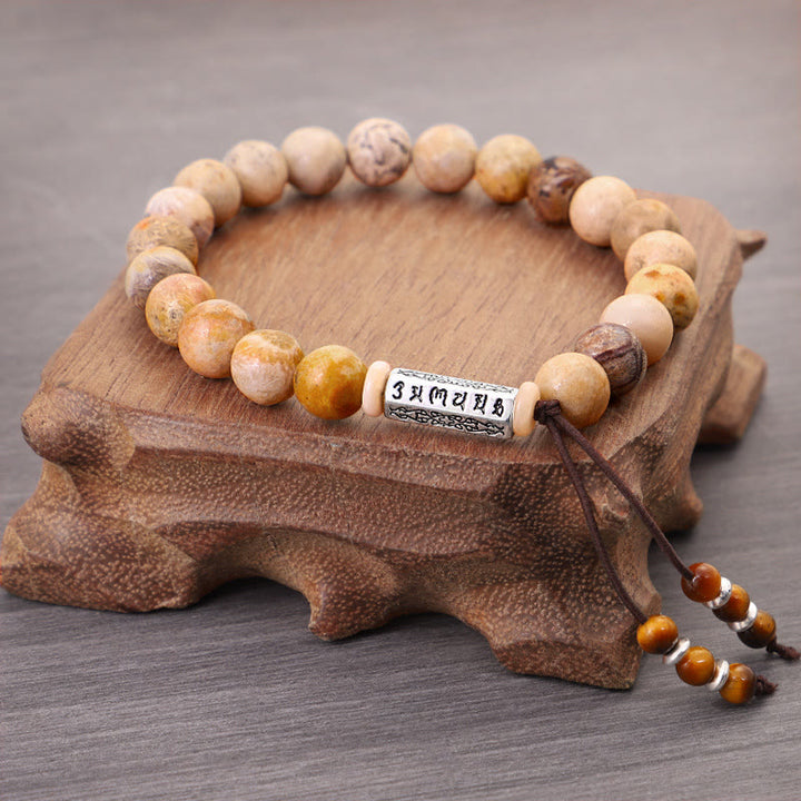 Buddha Stones Verweerde stenen Om Mani Padme Hum Versterkende Armband - image 1
