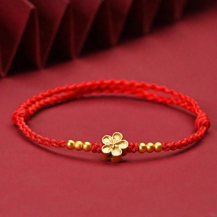 Buddha Stones Verstelbare rode Armband met gouden bloem ter bescherming - Rood (Polsomtrek: 14–18 cm) - image 0
