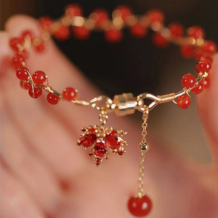 Buddha Stones Armband met gelukshanger in de vorm van een rood esdoornblad - image 1