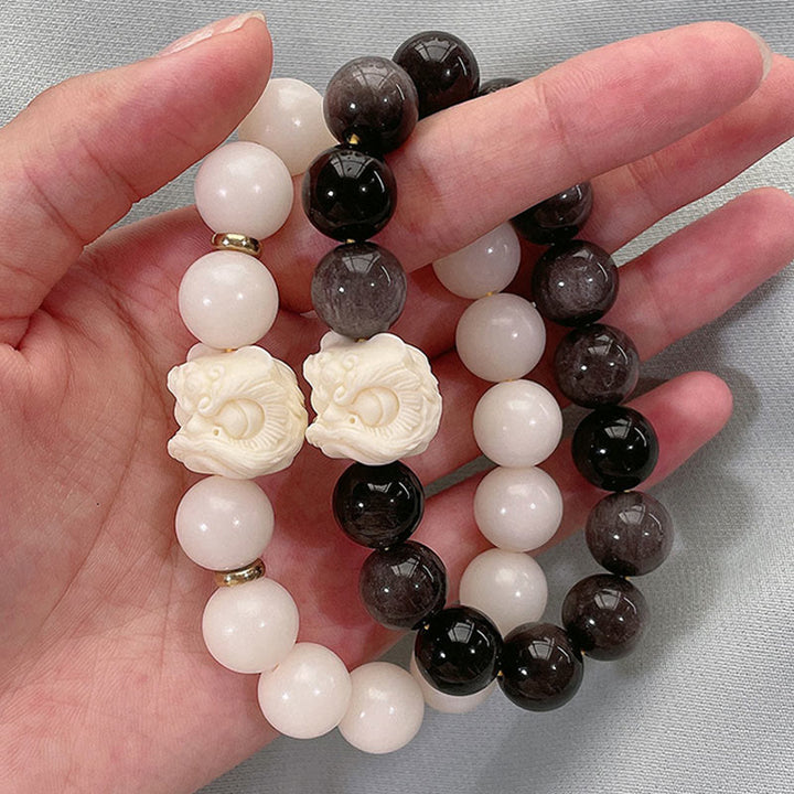 Buddha Stones Zilveren Obsidiaan Bodhizaad Ivoor Fruit Dansende Leeuw Armband - image 2