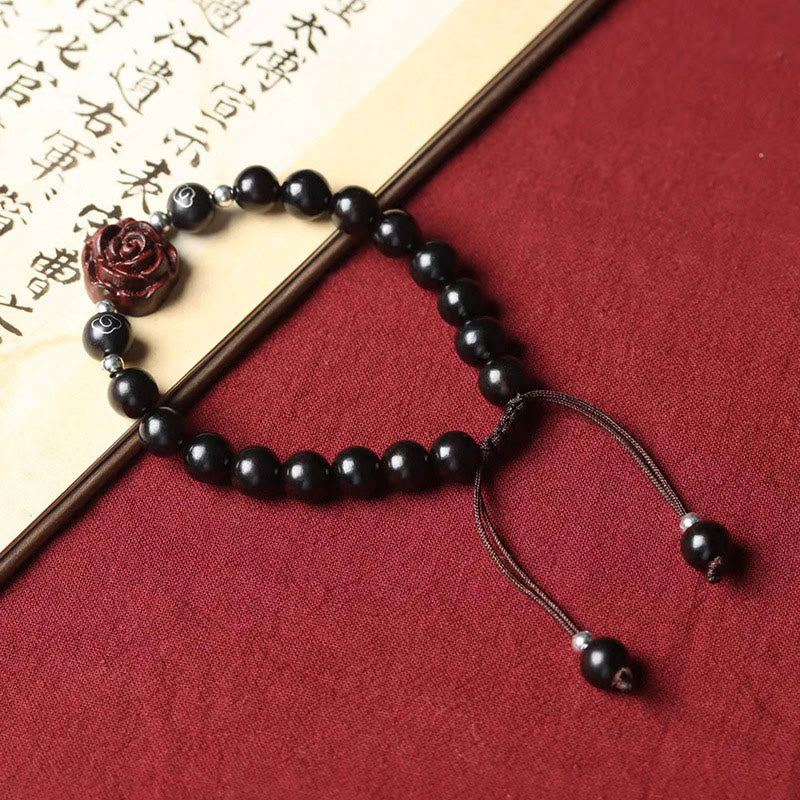 Buddha Stones Kleine blaadjes rode sandelhout kalmerende Armband - image 1