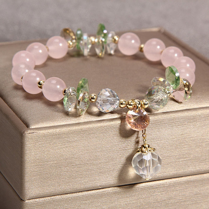 Buddha Stones Armband met vredesbedeltje in de vorm van een kattenoog, roze kristal - image 2
