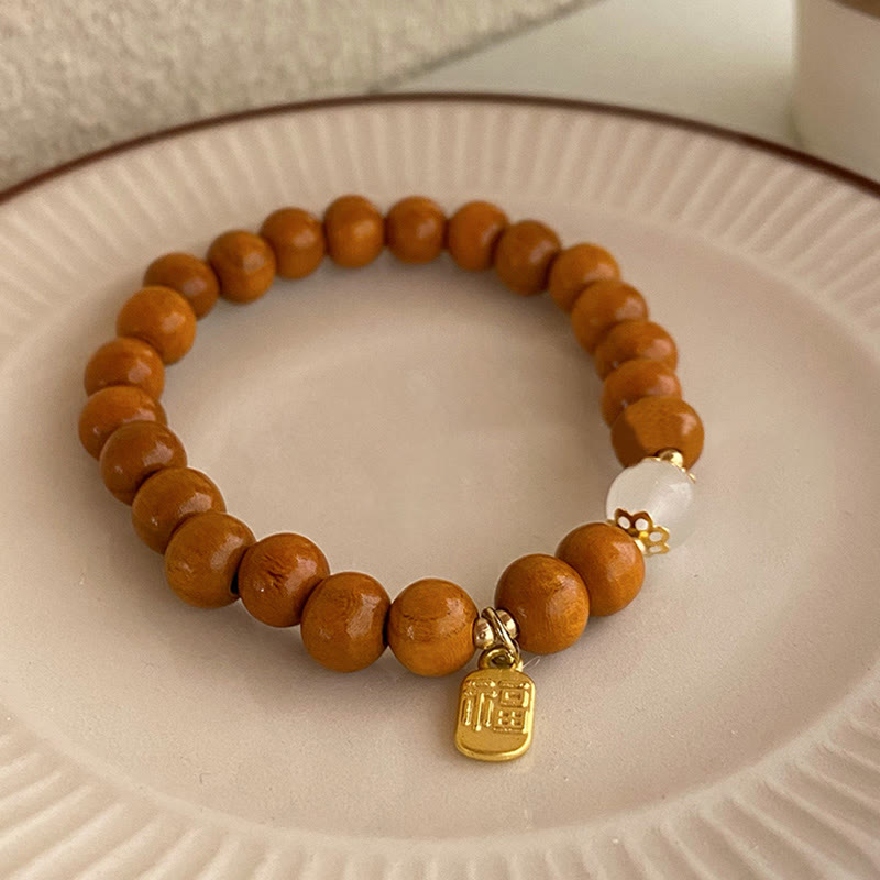 Buddha Stones Armband met bedeltje van sandelhout, kattenoog en Fu-figuur. - Sandelhout Fu-personage - image 2