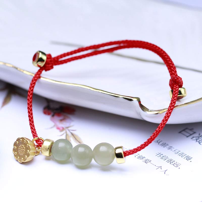 Buddha Stones Armband van natuurlijk jade, lotuszaad en rood koord. - image 3