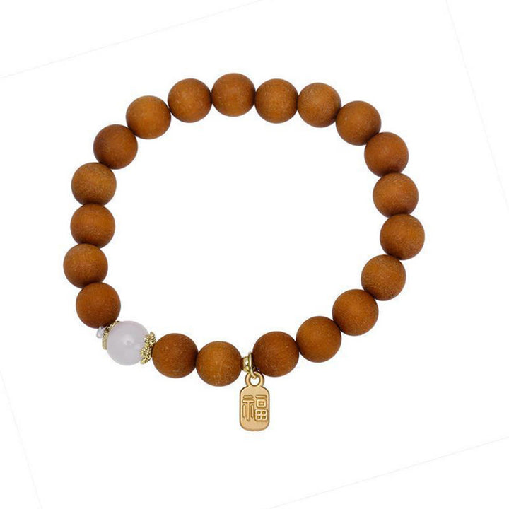 Buddha Stones Armband met bedeltje van sandelhout, kattenoog en Fu-figuur. - image 6