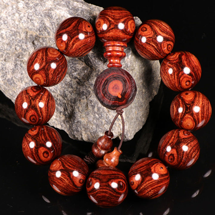 Buddha Stones Armband van Tibetaans palissanderhout met warmte-effect (willekeurig type) - 30 mm (9 kralen) - image 0