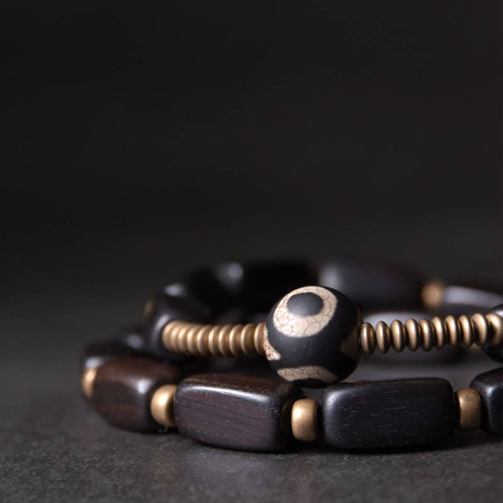 Buddha Stones Tibetaanse ebbenhouten Dzi-kraal koperen balans dubbele Armband - image 1