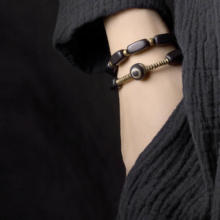 Buddha Stones Tibetaanse ebbenhouten Dzi-kraal koperen balans dubbele Armband - image 4