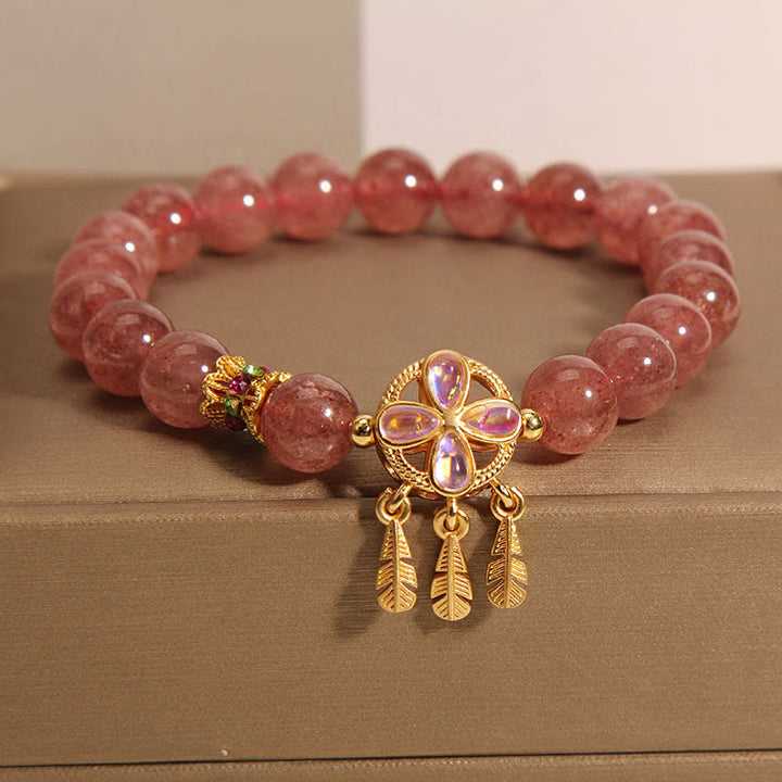 Buddha Stones Armband met bedeltje van een klavertje vier, gemaakt van natuurlijk aardbeikwarts. - image 3
