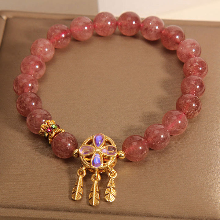 Buddha Stones Armband met bedeltje van een klavertje vier, gemaakt van natuurlijk aardbeikwarts. - image 6