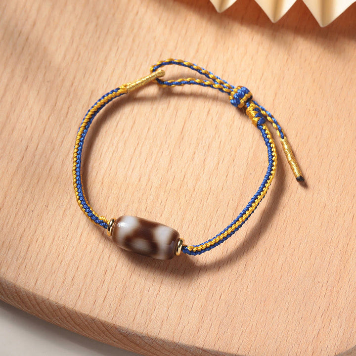 Buddha Stones Tibetaanse Armband met drie ogen (Dzi-kraal) - Drieoogige Dzi-kraal (Polsomtrek 14-18 cm) - image 0