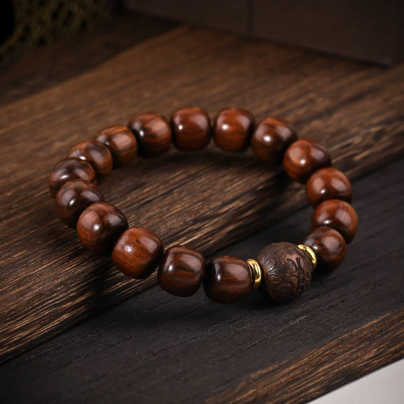 Buddha Stones Armband van natuurlijk rozenhout met symbool voor compassie. - image 1