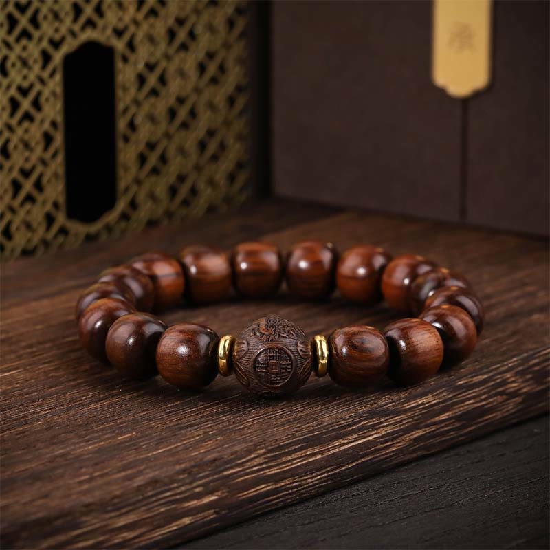 Buddha Stones Armband van natuurlijk rozenhout met symbool voor compassie. - Palissanderhout (Polsomtrek: 15-17 cm) - image 0