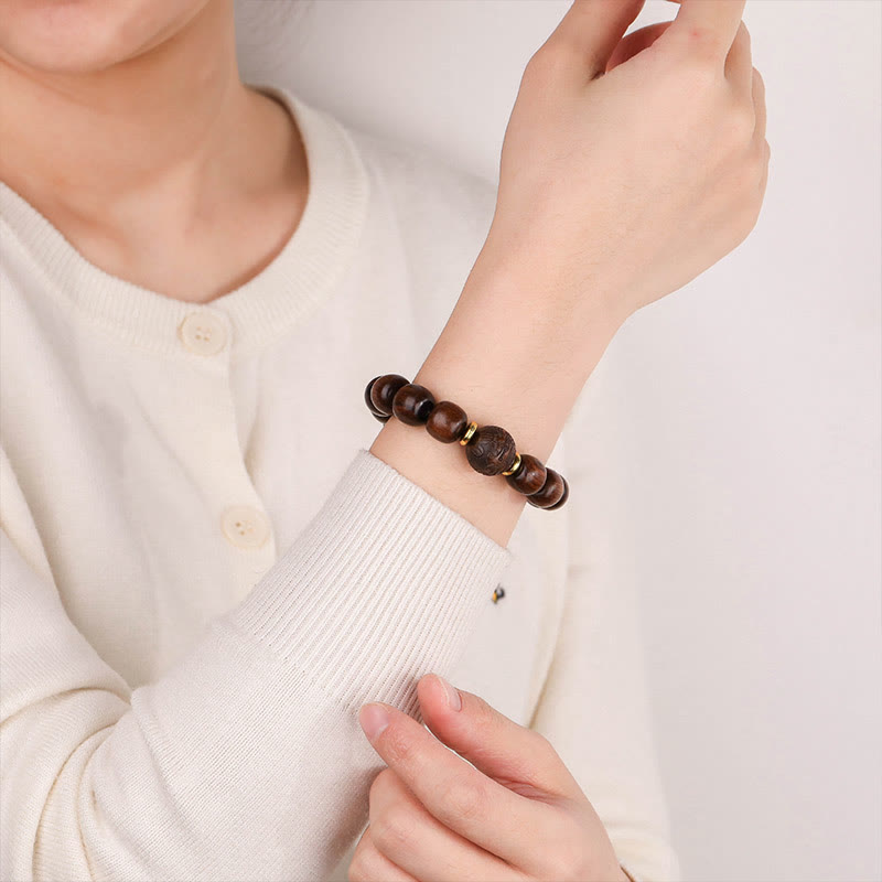 Buddha Stones Armband van natuurlijk rozenhout met symbool voor compassie. - image 5