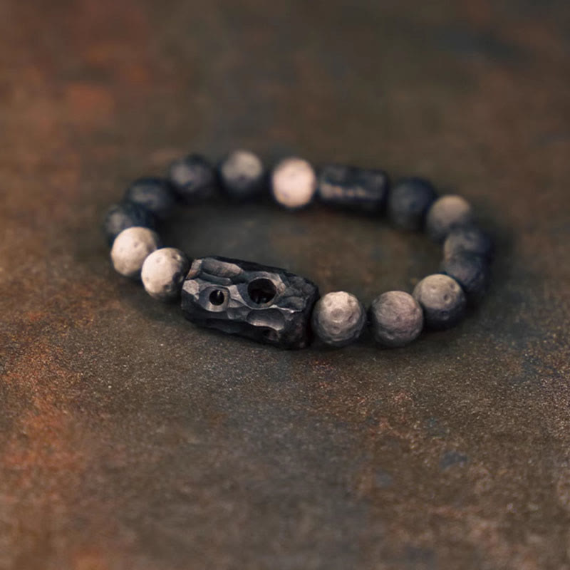 Buddha Stones Verzachtende Armband van obsidiaan en ebbenhout met zilverkleurige glans - image 0
