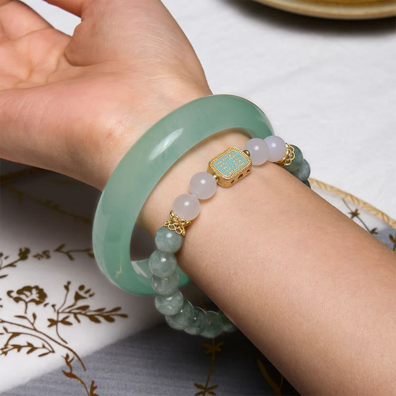 Buddha Stones Bevorder een nieuw begin met deze mintgroene jade Bangle-armband. - image 1