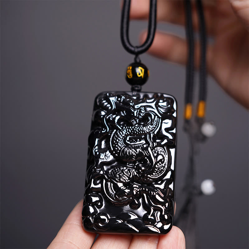 Buddha Stones Natuurlijke zwarte obsidiaan rechthoekige draak gegraveerde succes Ketting - Draak 62mm*39mm - image 0