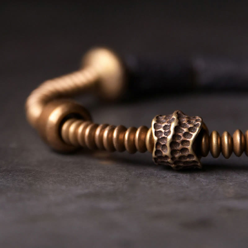 Buddha Stones Armband met zwarte lavasteen kralen en koperen accenten voor geluk en rijkdom. - image 1
