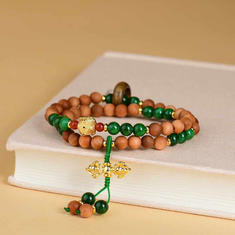 Buddha Stones Sandelhouten kralen Tibet Dorje Vajra Dubbelgedraaid Ontwerp Beschermende Genezende Armband - image 1