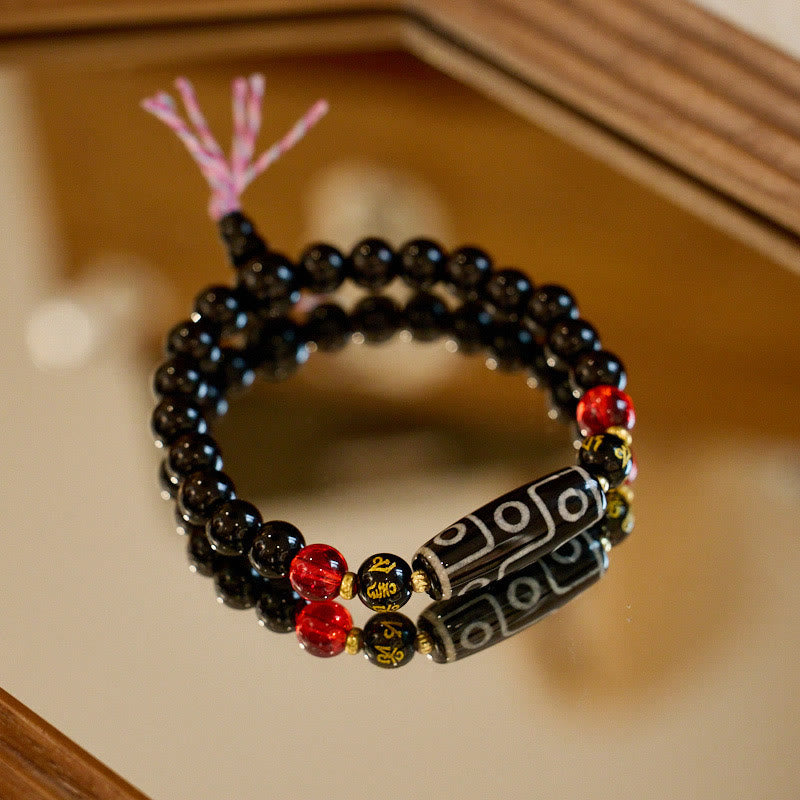 Buddha Stones Tibetaanse negenoog Dzi-kraal, zwarte onyx, Armband met zes ware woorden voor bescherming van rijkdom. - Negenoog Dzi-kraal van zwarte onyx (Polsomtrek 14-16 cm) - image 0