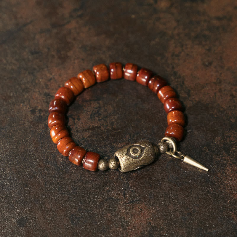 Buddha Stones Armband met hanger in de vorm van een koperen kegel en botkralen (Dzi-vorm) ter bevordering van kracht. - image 1
