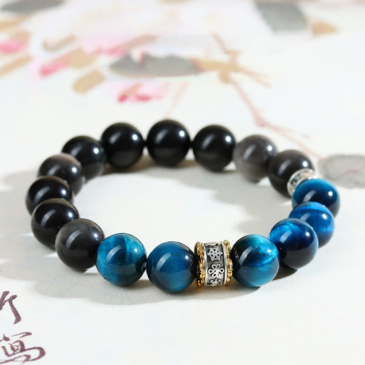 Buddha Stones Blauwe tijgeroog obsidiaan Armband met zilverkleurige glans - image 8