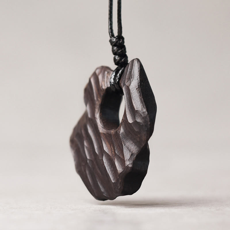Buddha Stones Ketting van ebbenhout met holle, onregelmatige vorm en vredessymbool - image 2