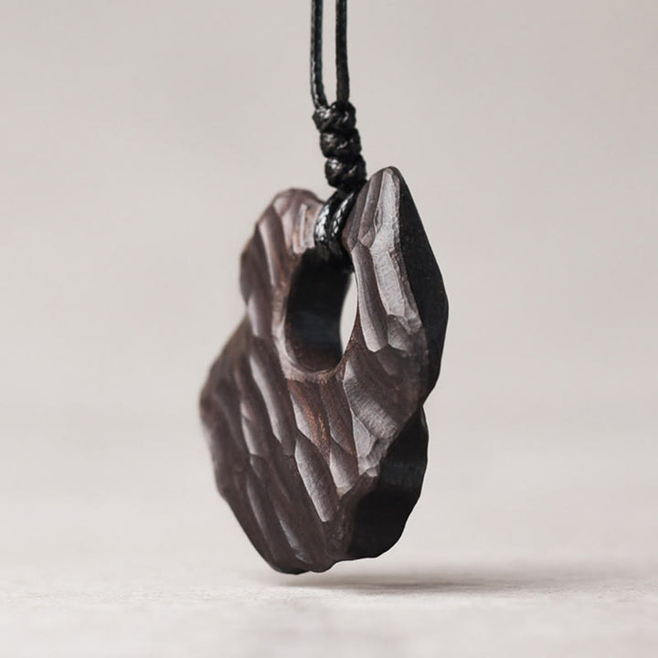 Buddha Stones Ketting van ebbenhout met holle, onregelmatige vorm en vredessymbool - image 2