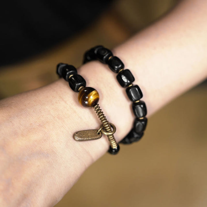 Buddha Stones Ebbenhouten armband van koper en messing met tijgeroog en vredesmotief, dubbele Armband - image 11