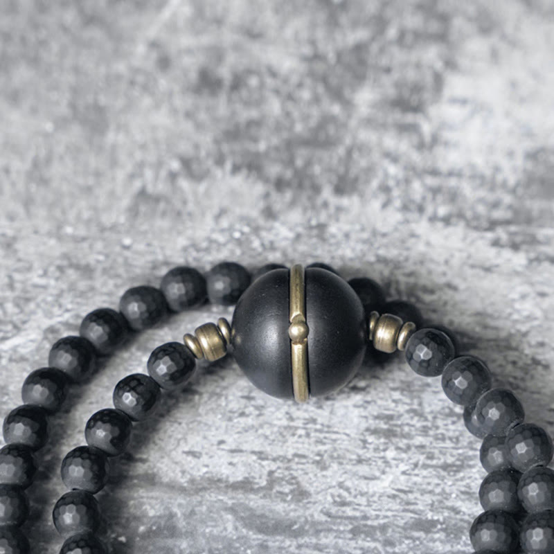 Buddha Stones Armband met dubbele wikkeling en geslepen zwarte onyx en ebbenhouten kralen, afgewerkt met een matte afwerking. - image 1