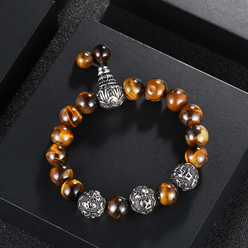 Buddha Stones Armband van natuurlijk tijgeroog, lavasteen, zwarte obsidiaan, titaniumstaal en de zes ware woorden Om Mani Padme Hum. - image 1