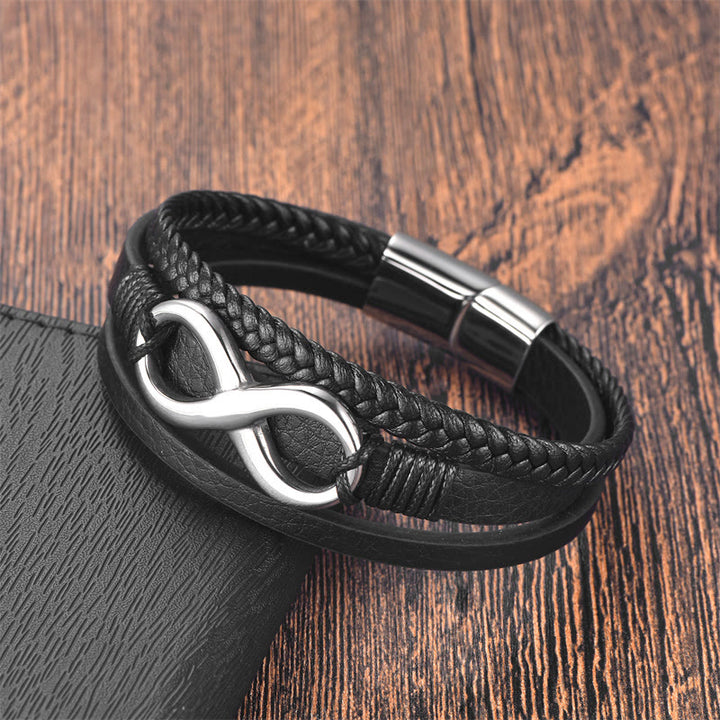 Buddha Stones Eeuwige Eindeloze Knoop Oneindigheidssymbool Armband van Titanium Staal met Rustige Leren Gesp - image 1