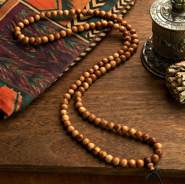 Buddha Stones 108 Mala kralen, blikseminslag, perzikhout, handgepolijste Armband - image 1