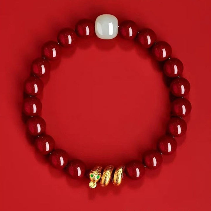 Buddha Stones Armband met cinnaberkralen, Hetian-jade en de zegen van het Jaar van de Slang. - image 2