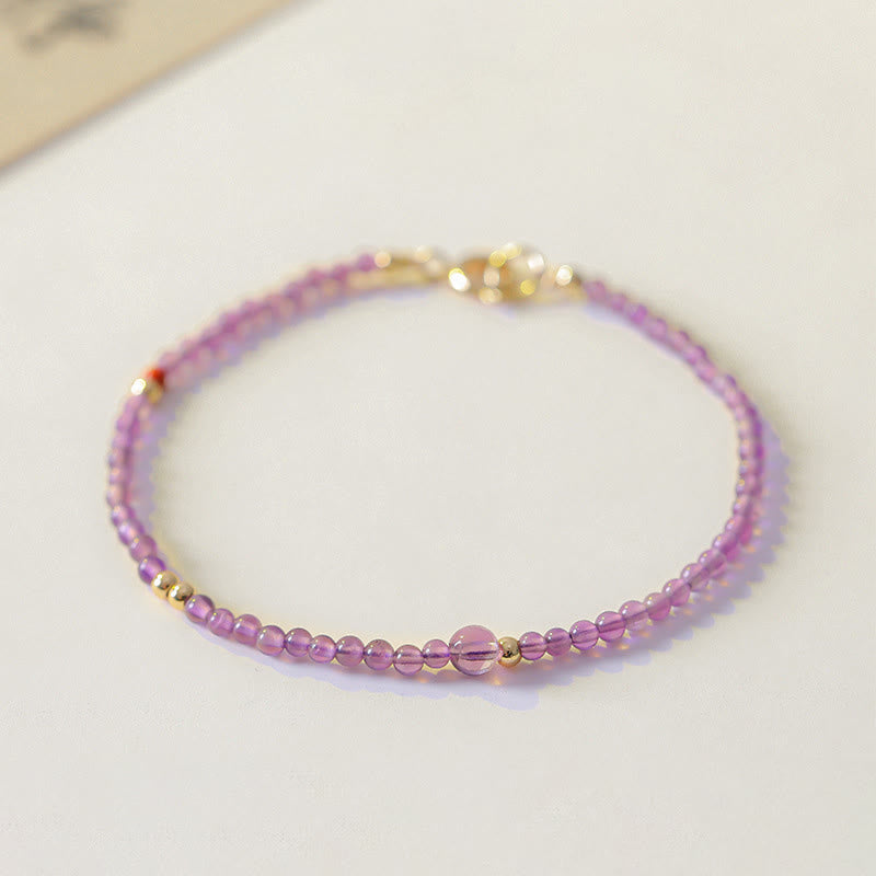Buddha Stones Armband voor innerlijke rust, gemaakt van 2 mm ultradunne kralen van natuurlijke amethist en 14k verguld koper. - image 1