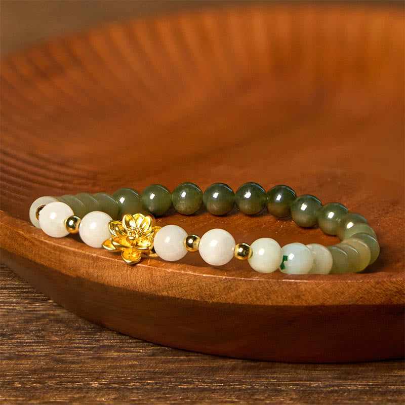 Buddha Stones Armband van natuurlijke Hetian-jade met kleurverloop en lotusbloemmotief. - image 1