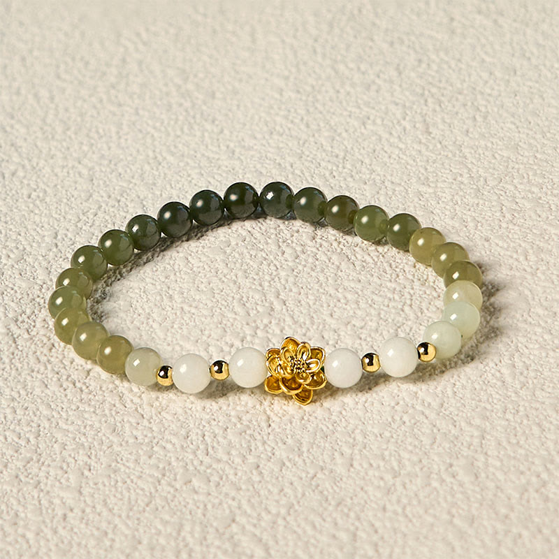 Buddha Stones Armband van natuurlijke Hetian-jade met kleurverloop en lotusbloemmotief. - image 3