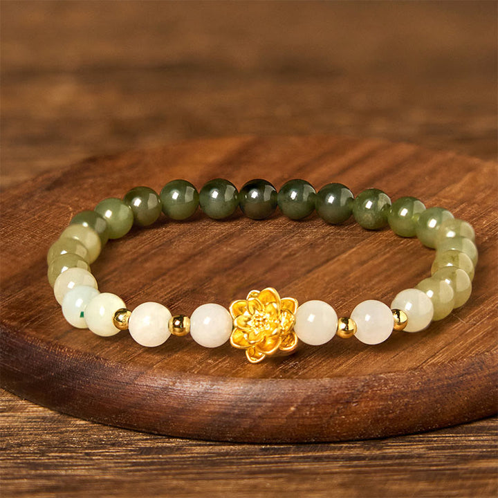 Buddha Stones Armband van natuurlijke Hetian-jade met kleurverloop en lotusbloemmotief. - image 2