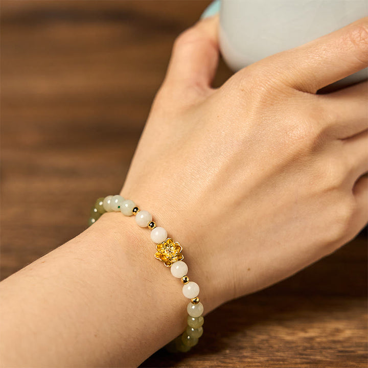 Buddha Stones Armband van natuurlijke Hetian-jade met kleurverloop en lotusbloemmotief. - image 5