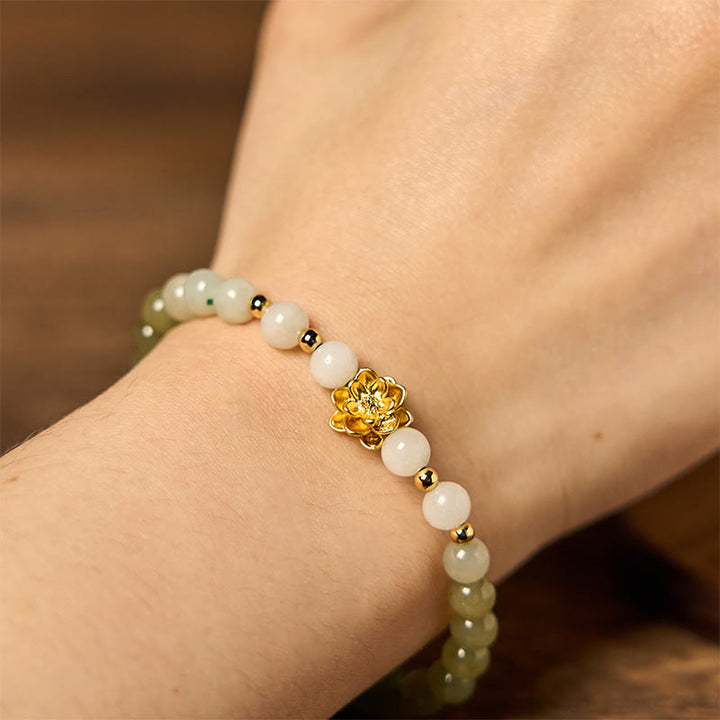 Buddha Stones Armband van natuurlijke Hetian-jade met kleurverloop en lotusbloemmotief. - image 6