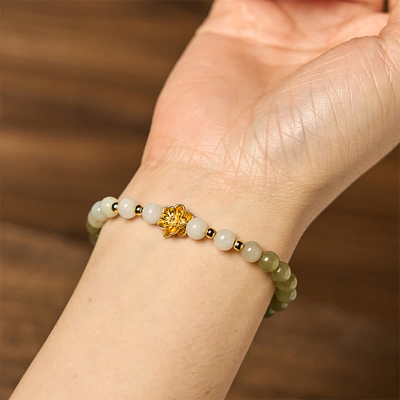 Buddha Stones Armband van natuurlijke Hetian-jade met kleurverloop en lotusbloemmotief. - image 4
