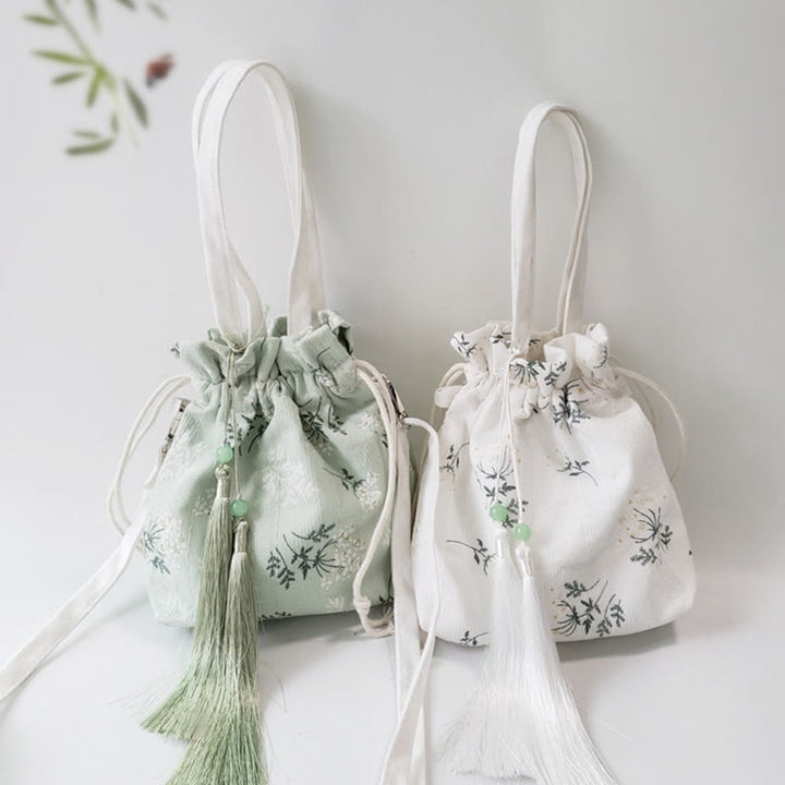 Buddha Stones Canvas draagtas met witte bloemen en groene bladeren, Schoudertas (crossbody), Schoudertas, Handtas - image 1