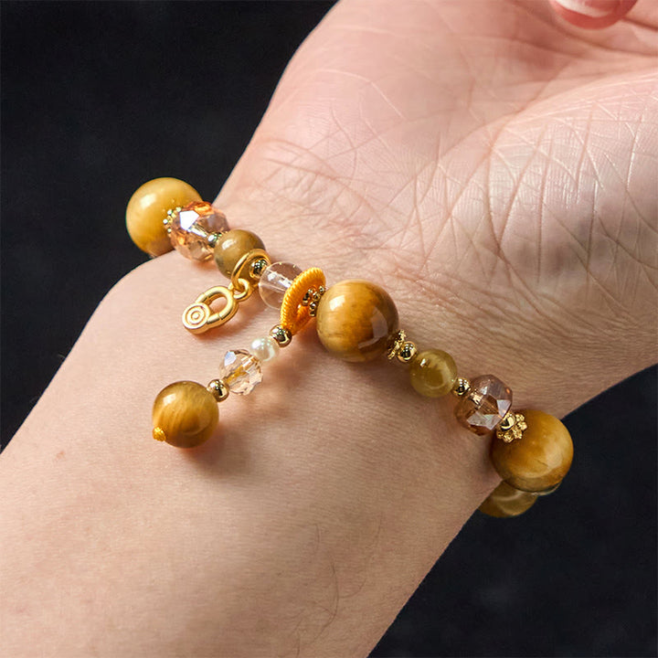 Buddha Stones Armband met natuurlijke tijgeroogkralen en extra gewicht. - image 3