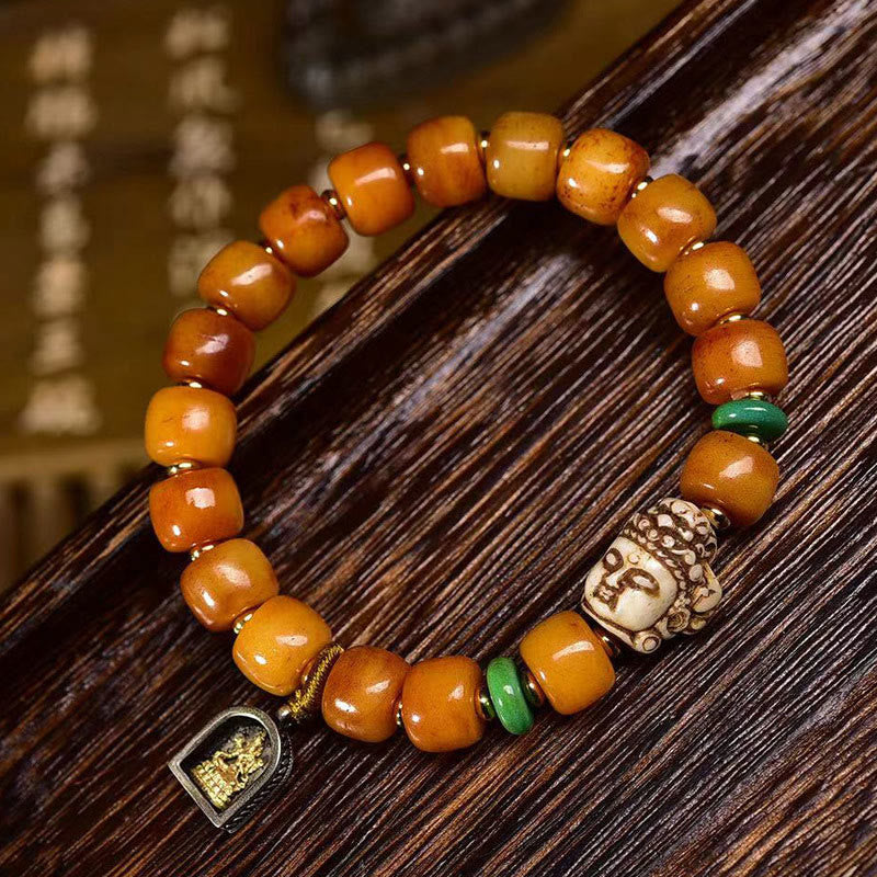 Buddha Stones Natuurlijke Tibetaanse armband met kralen van kameelbot in de vorm van een ton, met een Boeddha-hoofd Armband voor geluk en bescherming. - image 1