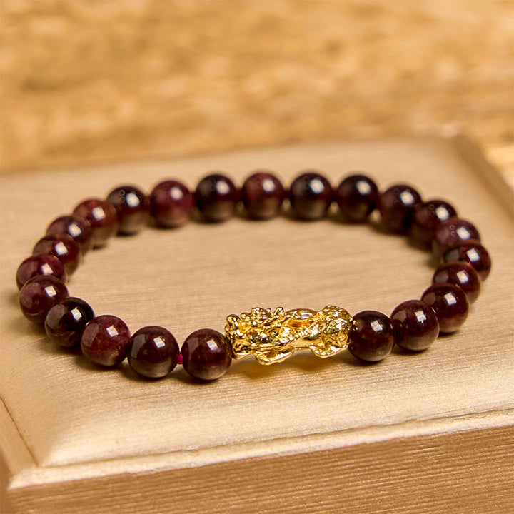 Buddha Stones Armband van PiXiu met natuurlijke granaatkralen - Granaat (Polsomtrek 14-16 cm) - image 0