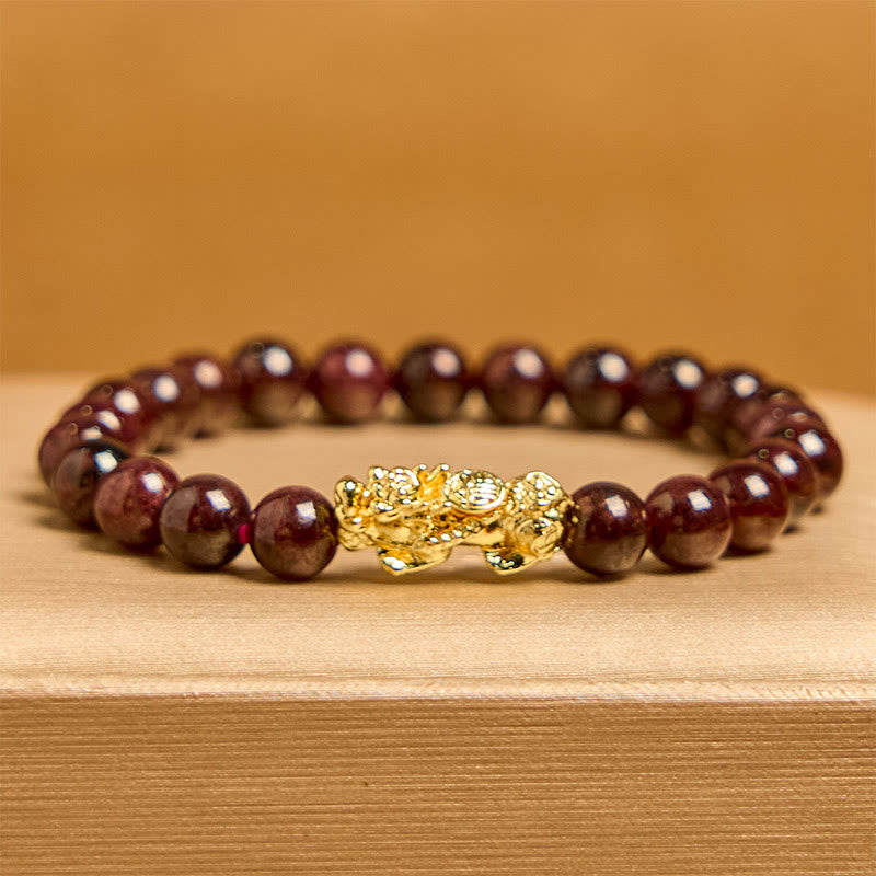 Buddha Stones Armband van PiXiu met natuurlijke granaatkralen - image 1