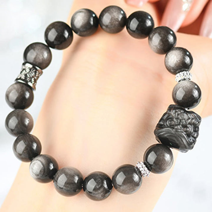 Buddha Stones Armband van obsidiaan met natuurlijke zilverglans en leeuwendans - image 10