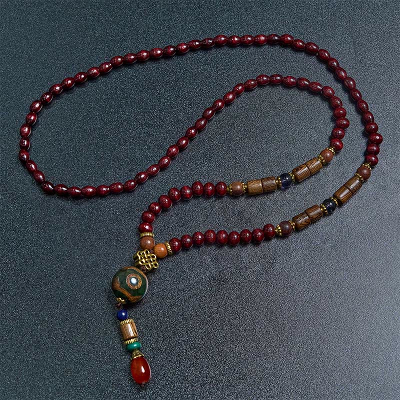 Buddha Stones Tibetaanse handgemaakte beschermende ketting met Ketting in de vorm van een olifantenkop, gemaakt van wengéhout. - image 1