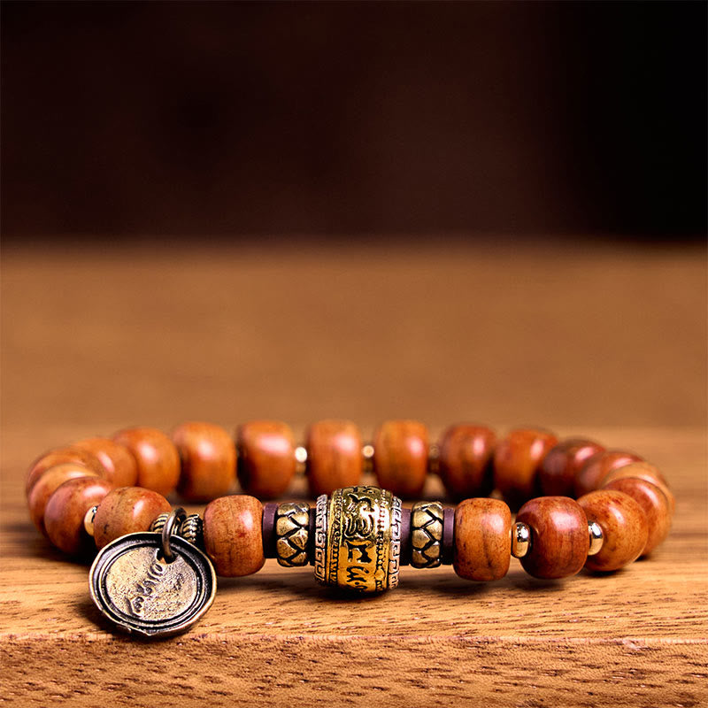 Buddha Stones Natuurlijke Tibetaanse kameelbot kralen in tonvorm, OM Sanskriet geluks- en Armband - image 1