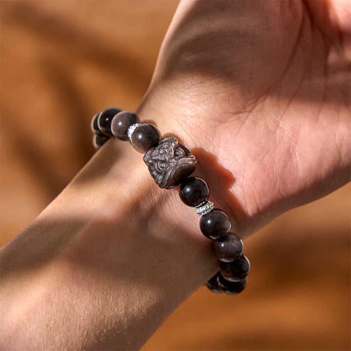 Buddha Stones Armband van obsidiaan met natuurlijke zilverglans en leeuwendans - image 4